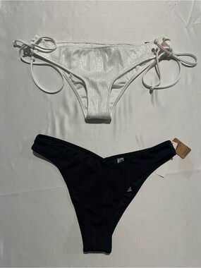New Victoria’s Secret Pink,  bikini bottoms plus a free gift size small